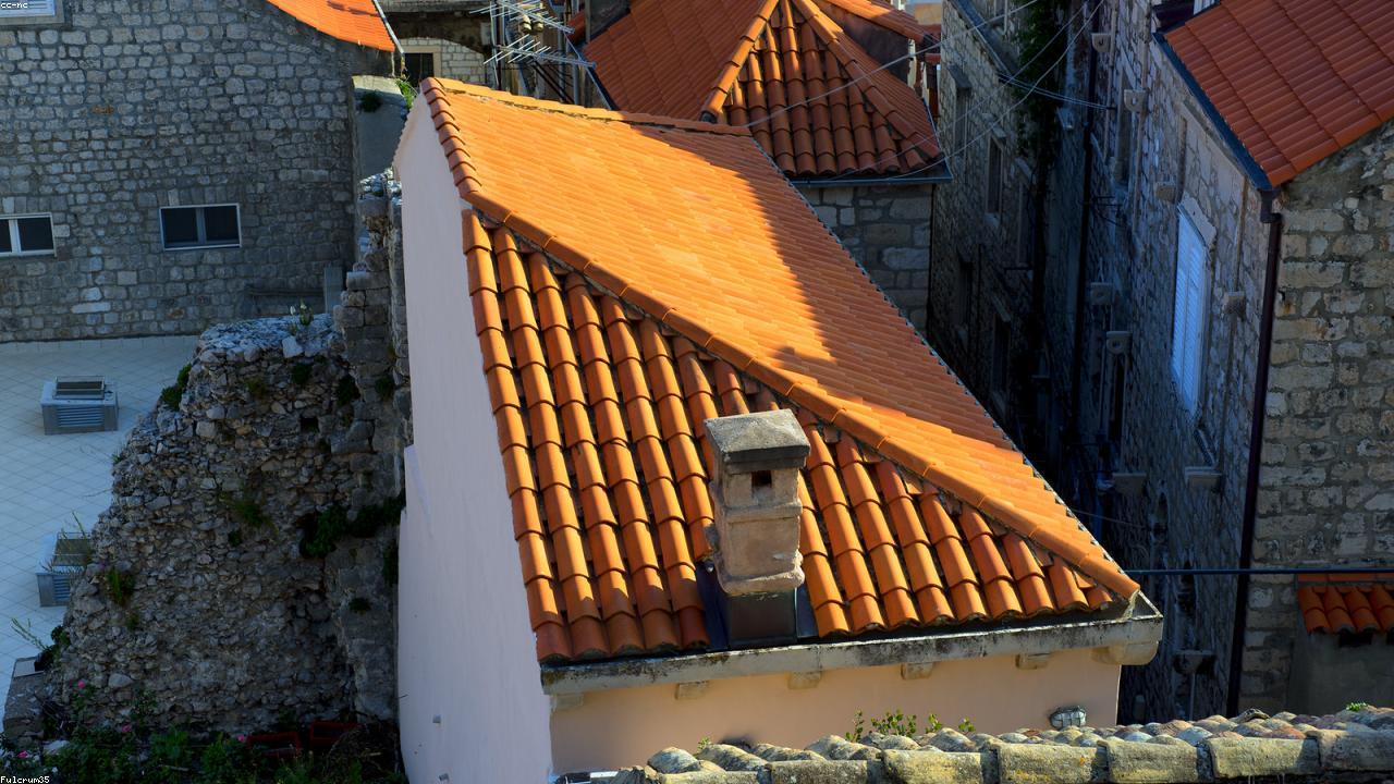 Terracotta rooftops within Dubrovnik's limestone walls.