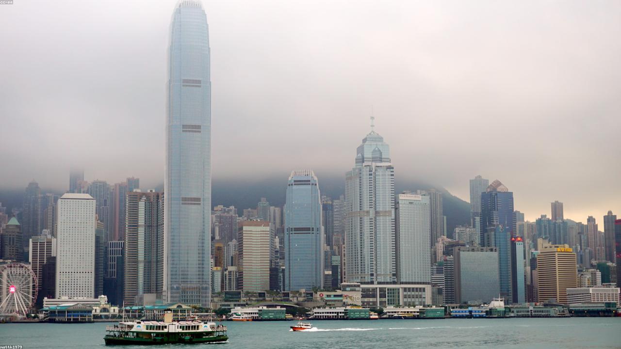 Hong Kong's harbour skyline at dusk from the Kowloon side.