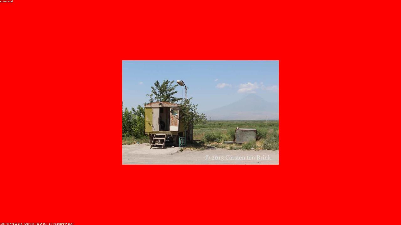 Mount Ararat rises beyond Yerevan at sunrise.